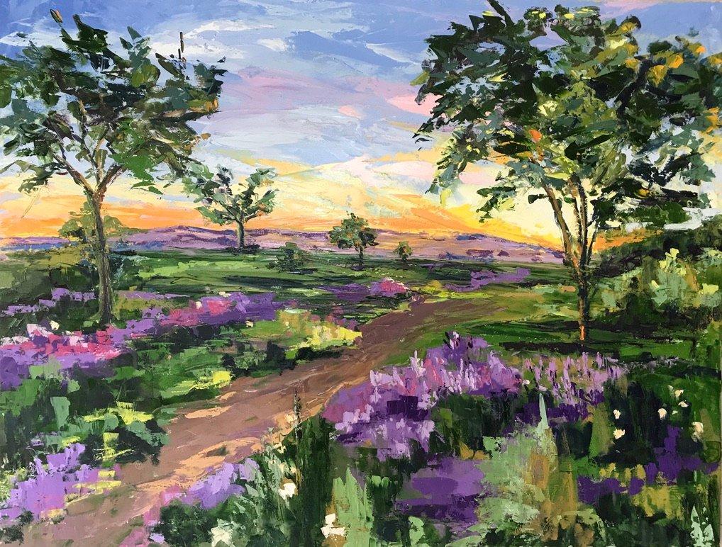 Paisaje de lavandas, jaras y encinas. Cielo naranja, rosa y azul.